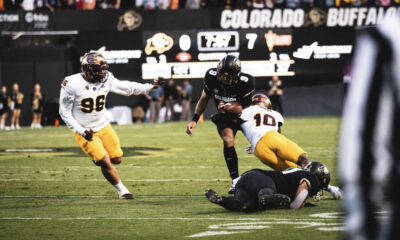 Arizona State defender makes a tackle against Colorado.