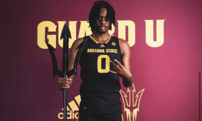 Kamari Lands posing in Arizona State basketball jersey.