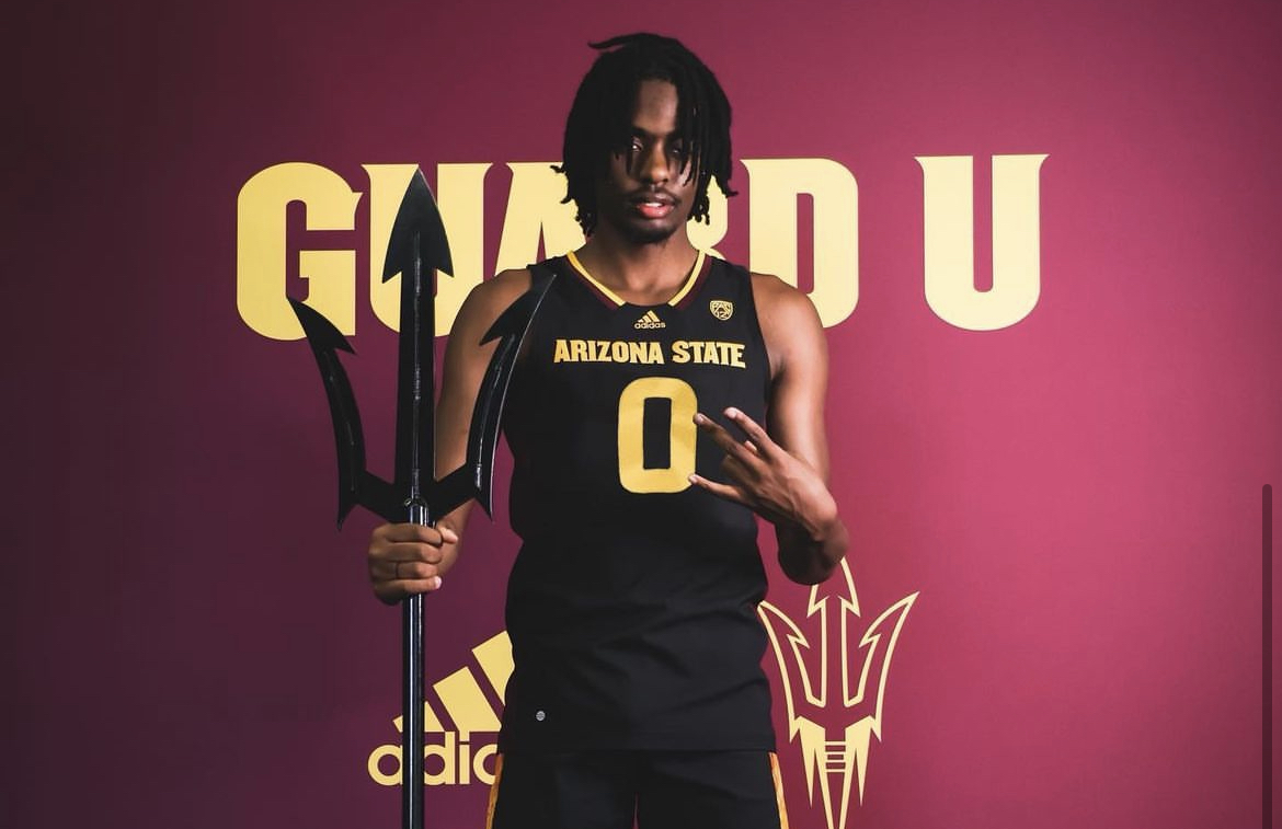 Kamari Lands posing in Arizona State basketball jersey.