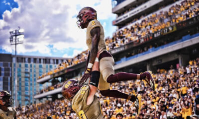 X Valladay celebrates a touchdown in Arizona State football's victory over Washington in 2022.