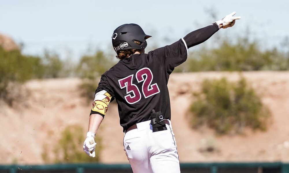 Luke Keaschall celebrates while baserunning.