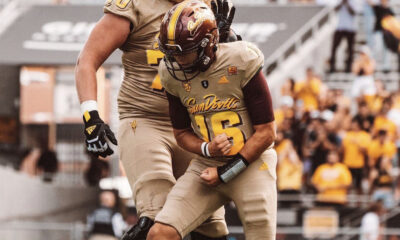 Arizona State QB Trenton Bourguet celebrates a touchdown against Washington.