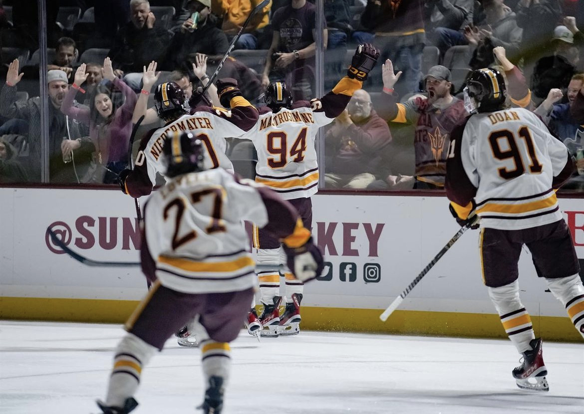 Robert Mastrosimone celebrates a goal for Arizona State hockey