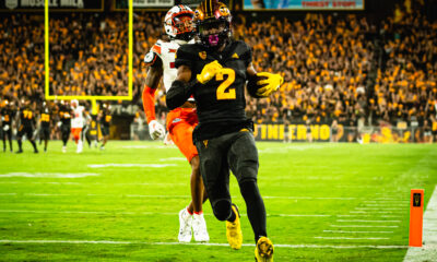 Elijhah Badger scores a touchdown for Arizona State football against Oklahoma State.