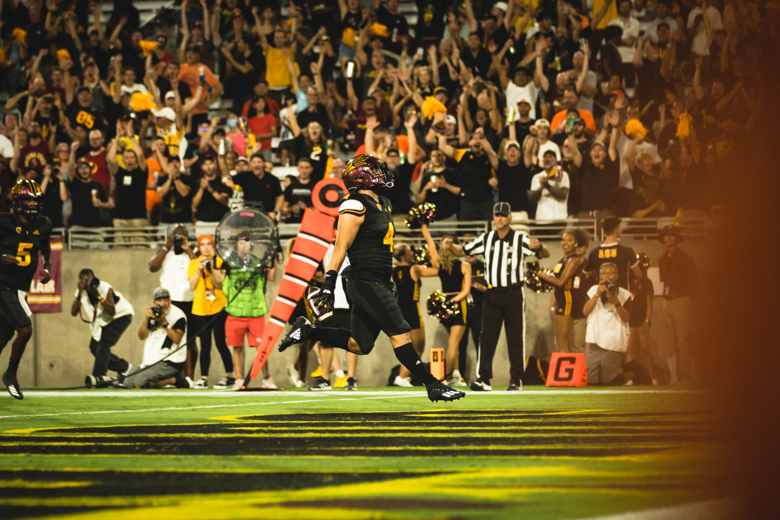 Cameron Skattebo scores a touchdown for ASU football