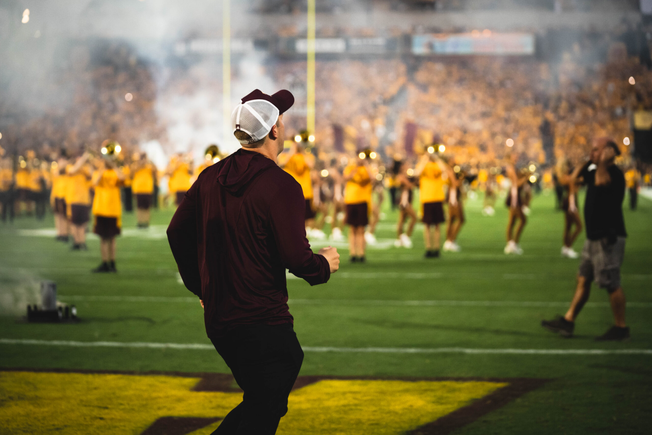 ASU football head coach Kenny Dillingham jogs out of the tunnel against Southern Utah.