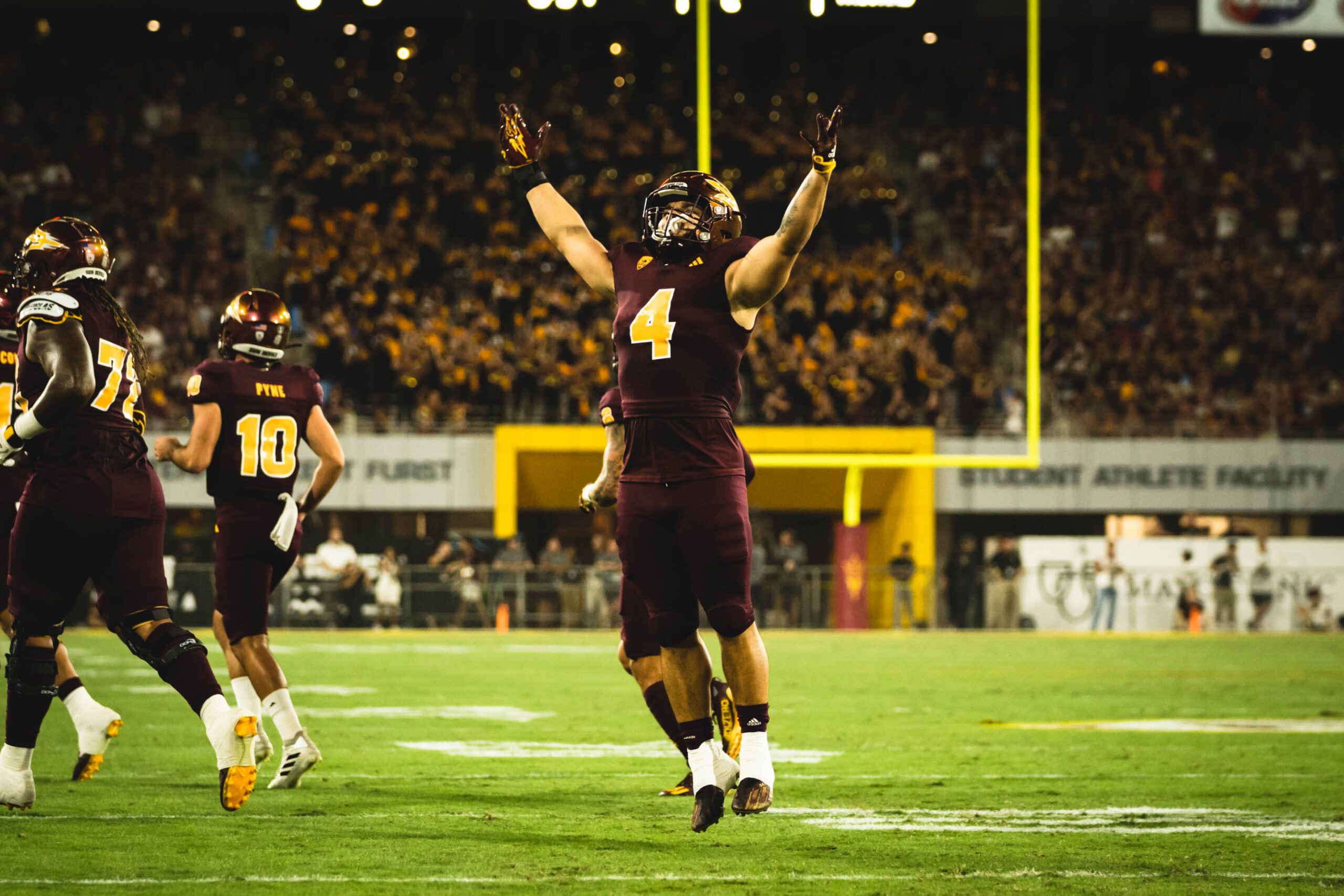 Arizona State running back Cam Skattebo celebrates.