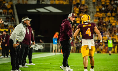 Kenny Dillingham of Arizona State football talks to Cam Skattebo during the Southern Utah game.