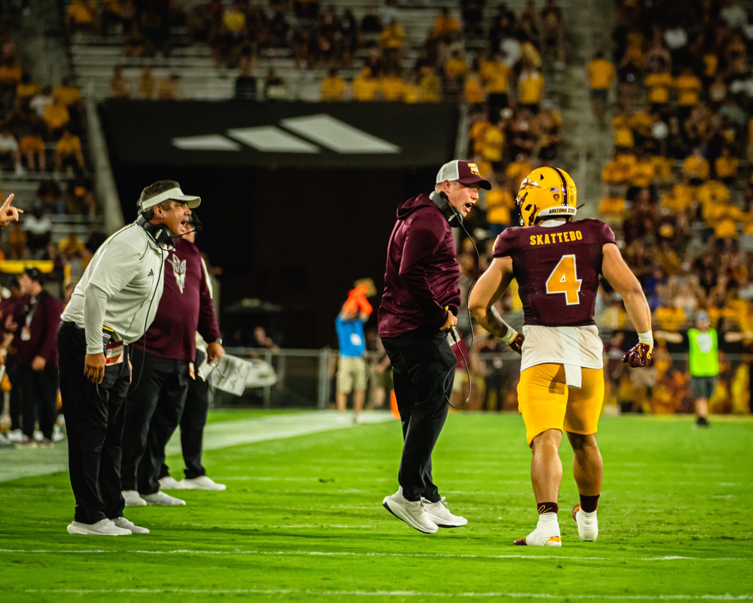 Kenny Dillingham of Arizona State football talks to Cam Skattebo during the Southern Utah game.