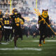 Arizona State football running on to the field.