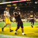 Arizona State football player Cam Skattebo celebrates a touchdown against USC.