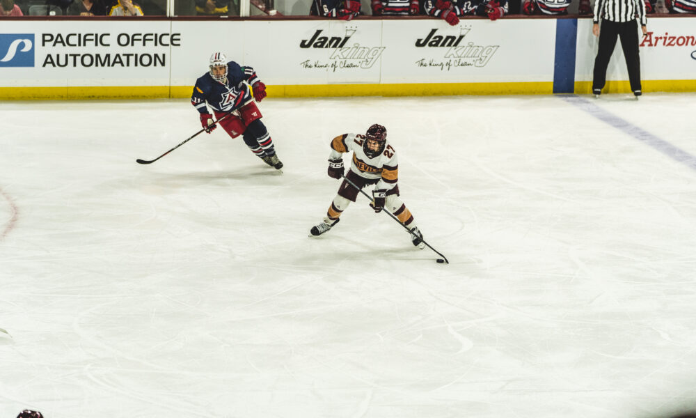 Arizona State hockey player skates against Arizona.