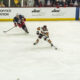 Arizona State hockey player skates against Arizona.