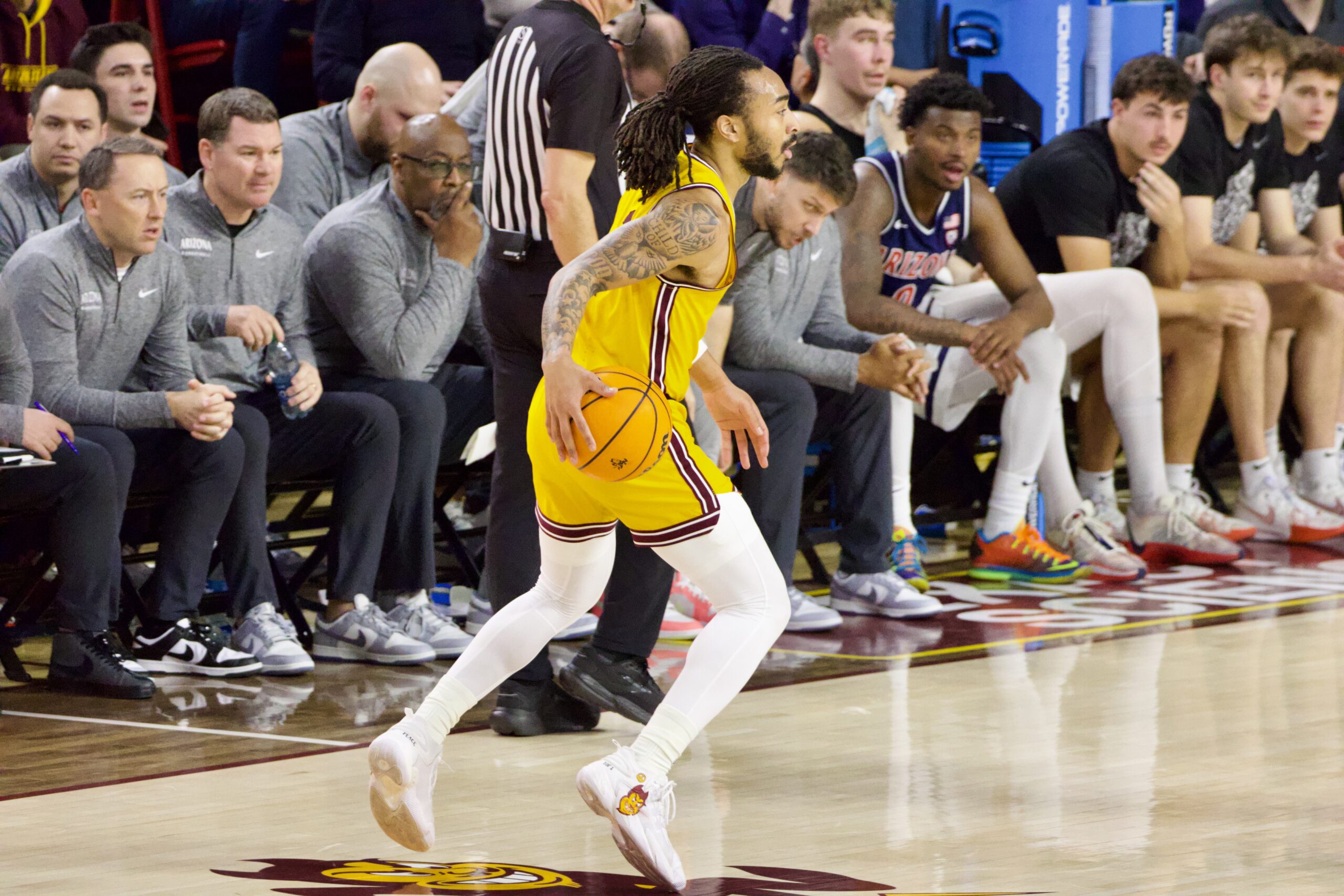 Frankie Collins of Arizona State basketball dribbles against Arizona.