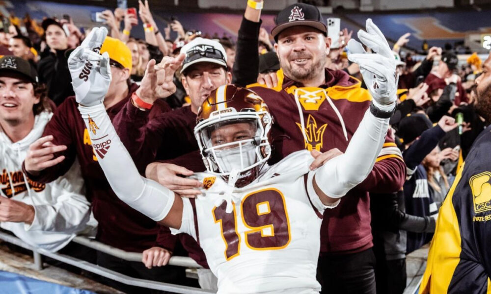 Keith Abney of ASU football celebrating a victory against UCLA.