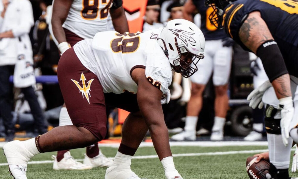 CJ Fite of Arizona State football lines up against a California offensive lineman.