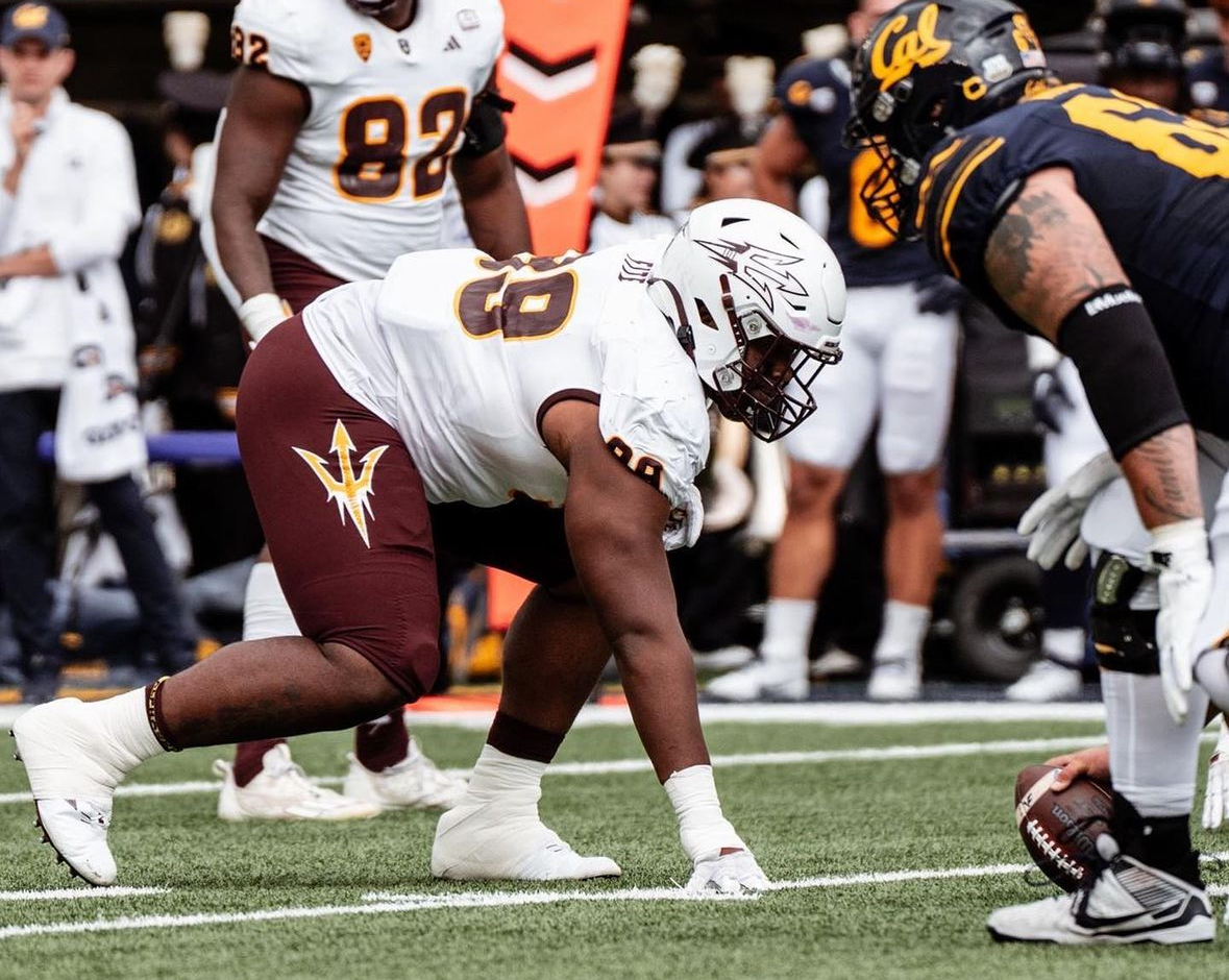 CJ Fite of Arizona State football lines up against a California offensive lineman.