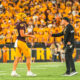 Kenny Dillingham and Sam Leavitt of ASU football talk on the sideline against Wyoming.