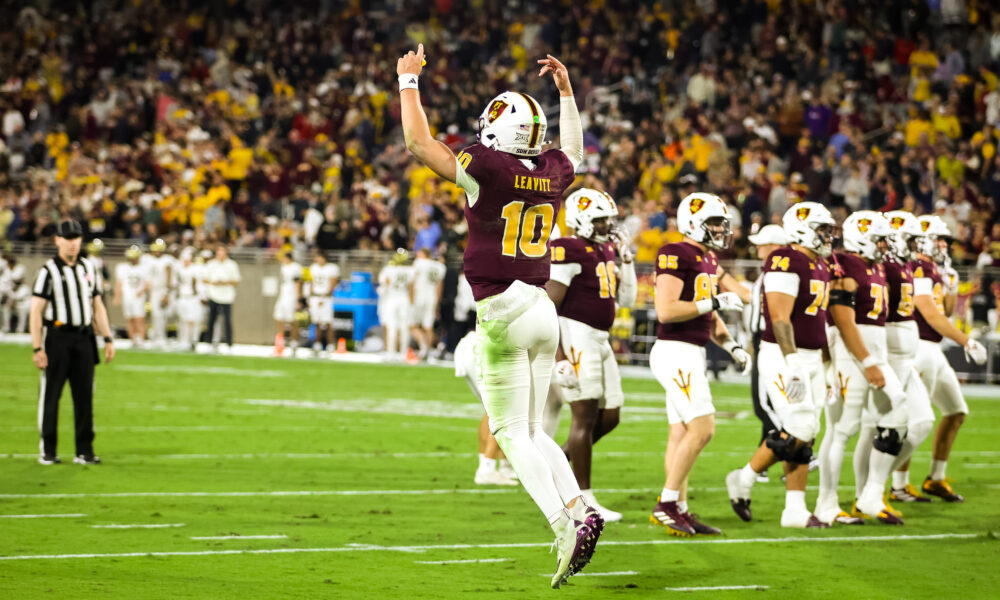 Sam Leavitt of ASU football celebrates a touchdown against UCF.