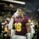 An Arizona State football player flashes "Forks Up" after a win over UCF.