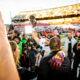 Arizona State's Cam Skattebo hoists the Territorial Cup after a win at Arizona Stadium on Nov. 30, 2024. The Territorial Cup Trophy is annually given to the winning team in the rivalry showdown between Arizona State and Arizona. (Photo by Sedona Levy/Sun Devil Daily)