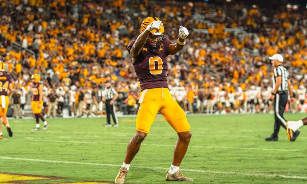 Jordyn Tyson of ASU football celebrates against Wyoming.