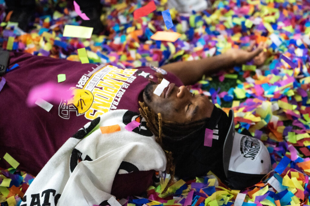 An Arizona State player celebrates in confetti after winning the Big 12 Championship. (Photo by Truitt Robinson/Sun Devil Daily)