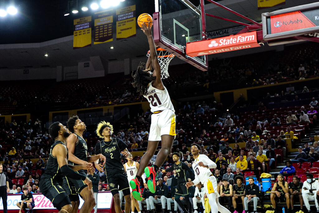 Jayden Quaintance skies for an ally-oop against UCF on Jan. 14, 2025. Quaintance stuffed the stat sheet against the Knights with a season high 20 points, as well as seven rebounds and five blocks. (Photo by Sedona Levy/Sun Devil Daily)