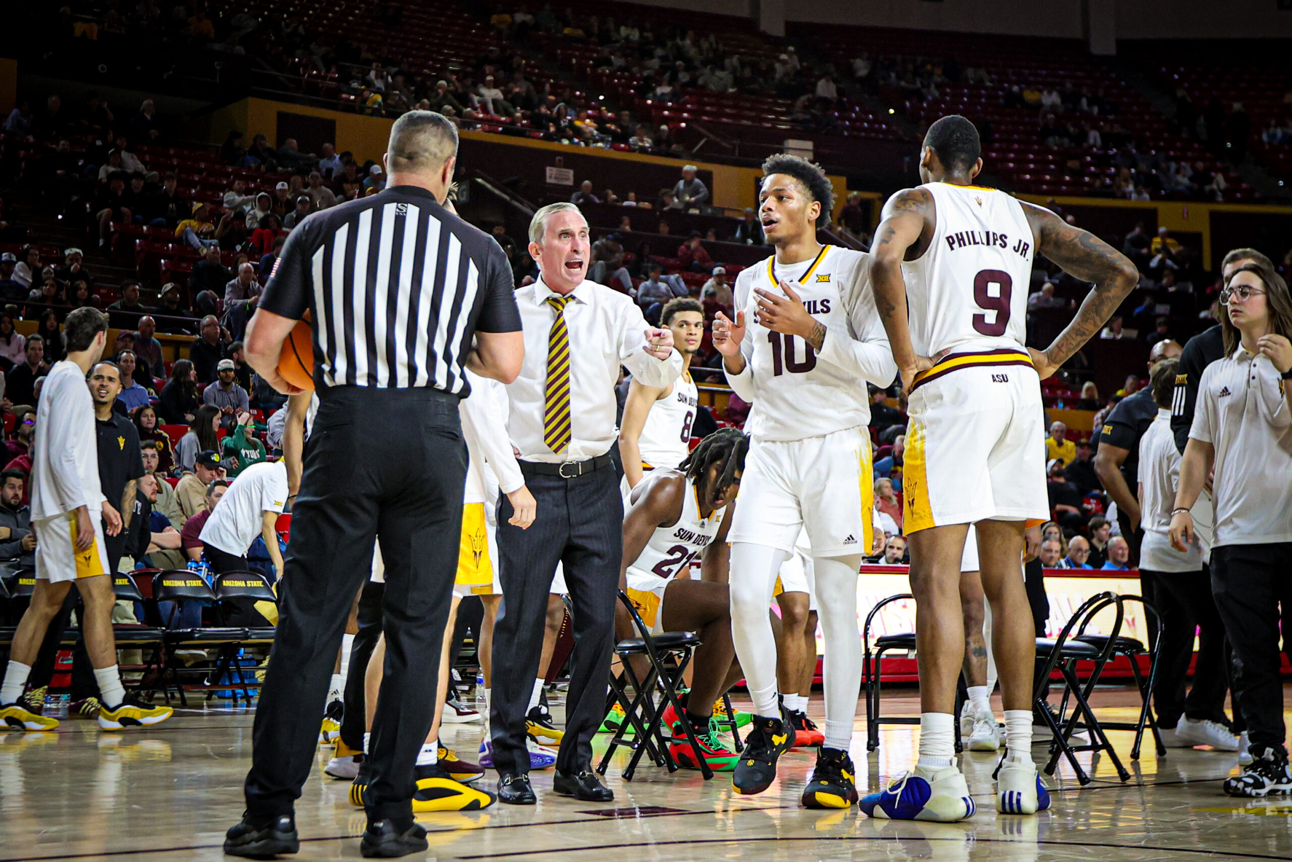 Bobby Hurley, coach of ASU basketball, berates the officials during a timeout in ASU's matchup with UCF on Jan. 14, 2025. (Photo by Sedona Levy/Sun Devil Daily)