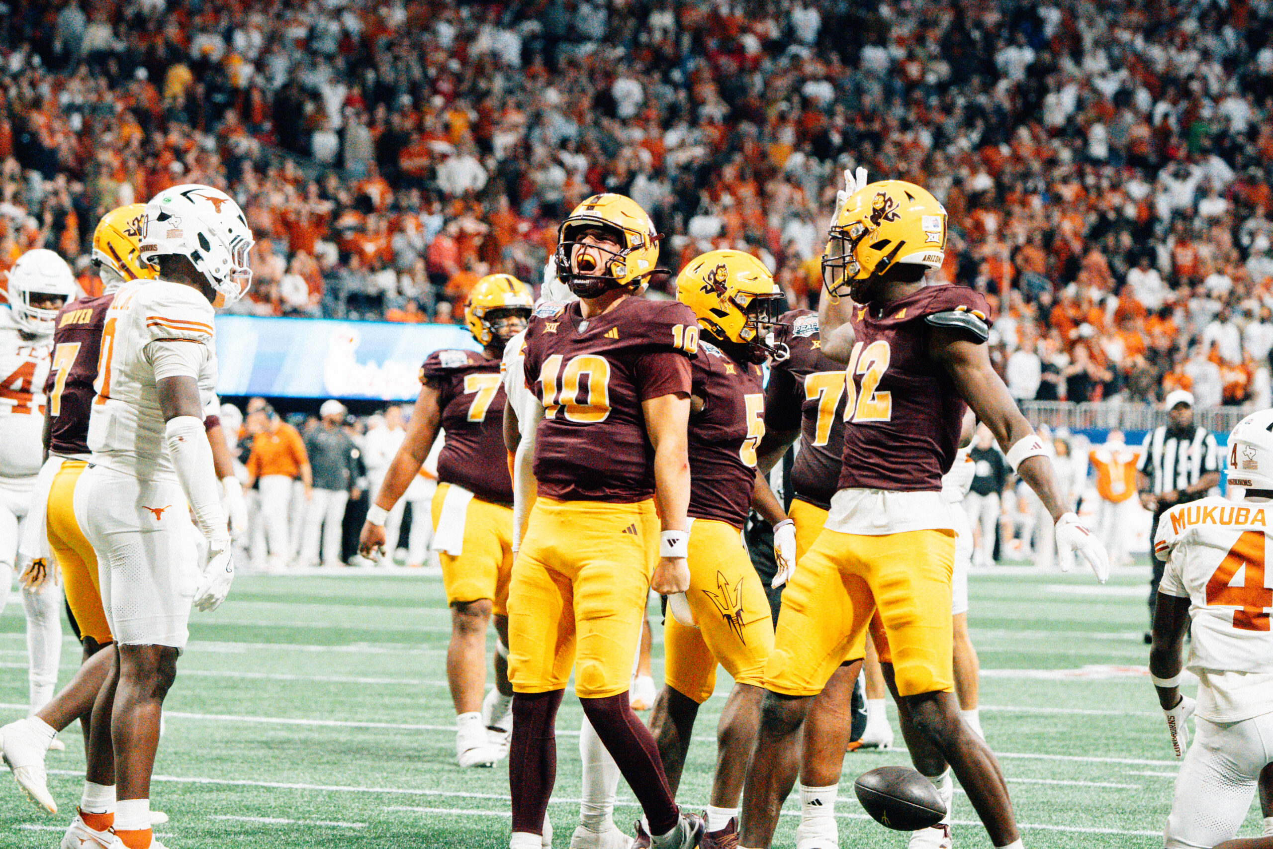 Arizona State quarterback Sam Leavitt hypes up the crowd in Arizona State's first ever CFP game at Mercedes-Benz Stadium in Atlanta on Jan. 1, 2025. (Photo by Daniel Appel/Sun Devil Daily)