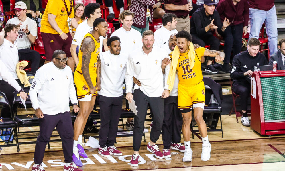 ASU coaches and player BJ Freeman react to an exciting moment in ASU's game against Arizona on Feb. 1, 2025 in Tempe.