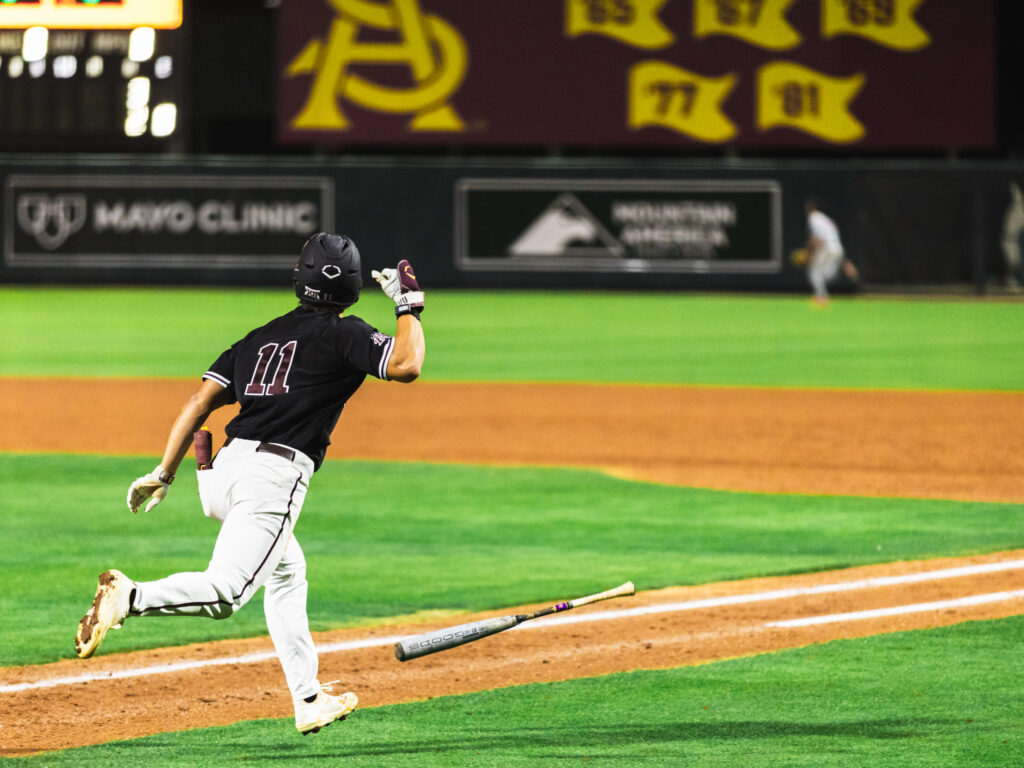 Kien Vu batflips after one of his two home runs in the win over UNLV at Phoenix Municipal Stadium. (Photo by Joshua Eaton/Sun Devil Daily)