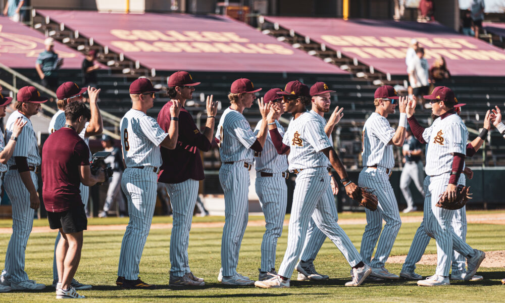 ASU baseball high fives each other before opening the series against Oral Roberts. (Photo by Joshua Eaton/Sun Devil Daily)