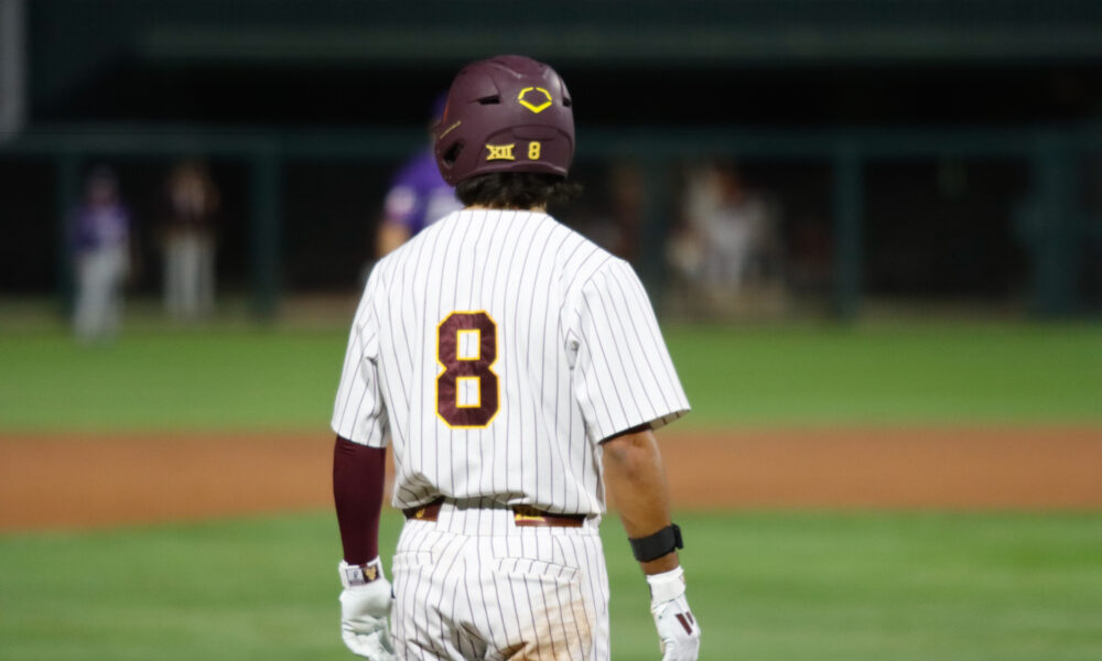 Sam Myers takes a lead off of third in a Friday night game against TCU on March 13, 2026 at Phoenix Municipal Stadium in Phoenix, Arizona