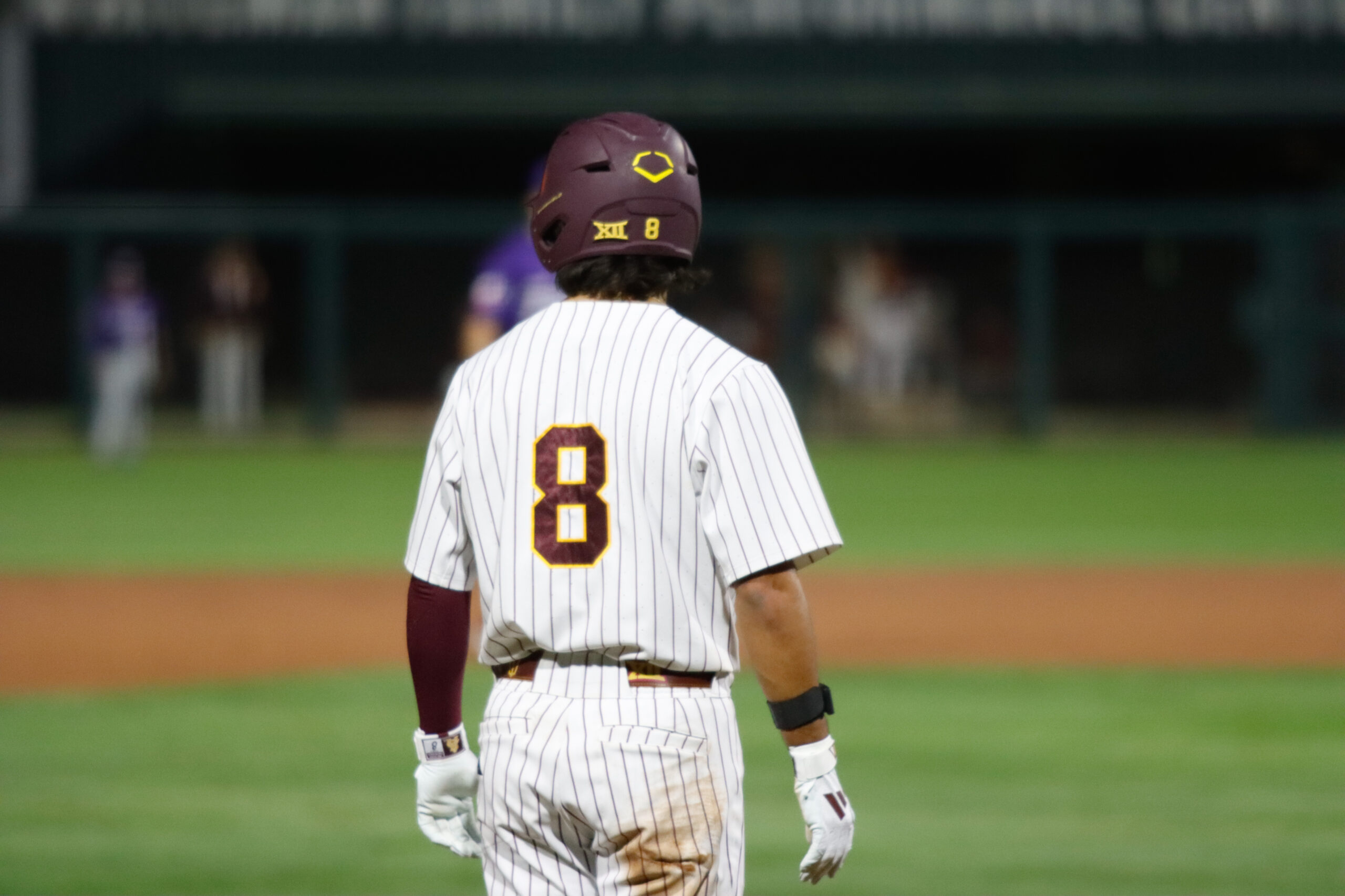 Sam Myers takes a lead off of third in a Friday night game against TCU on March 13, 2026 at Phoenix Municipal Stadium in Phoenix, Arizona